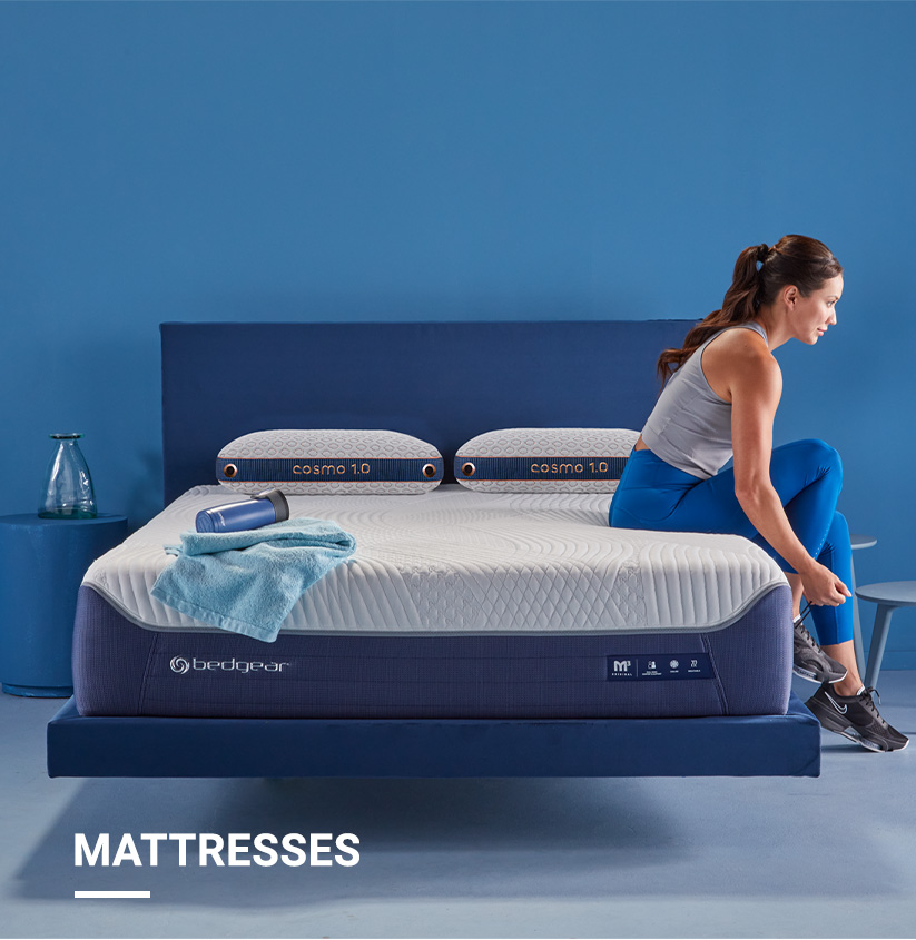 The M3 mattress offers personalized comfort for a woman waking refreshed and ready to exercise. She ties her shoelaces and gets ready for an active day.